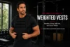 David Mitchell wearing a weighted vest in a gym for a guide to benefits, sizing, and safe use.